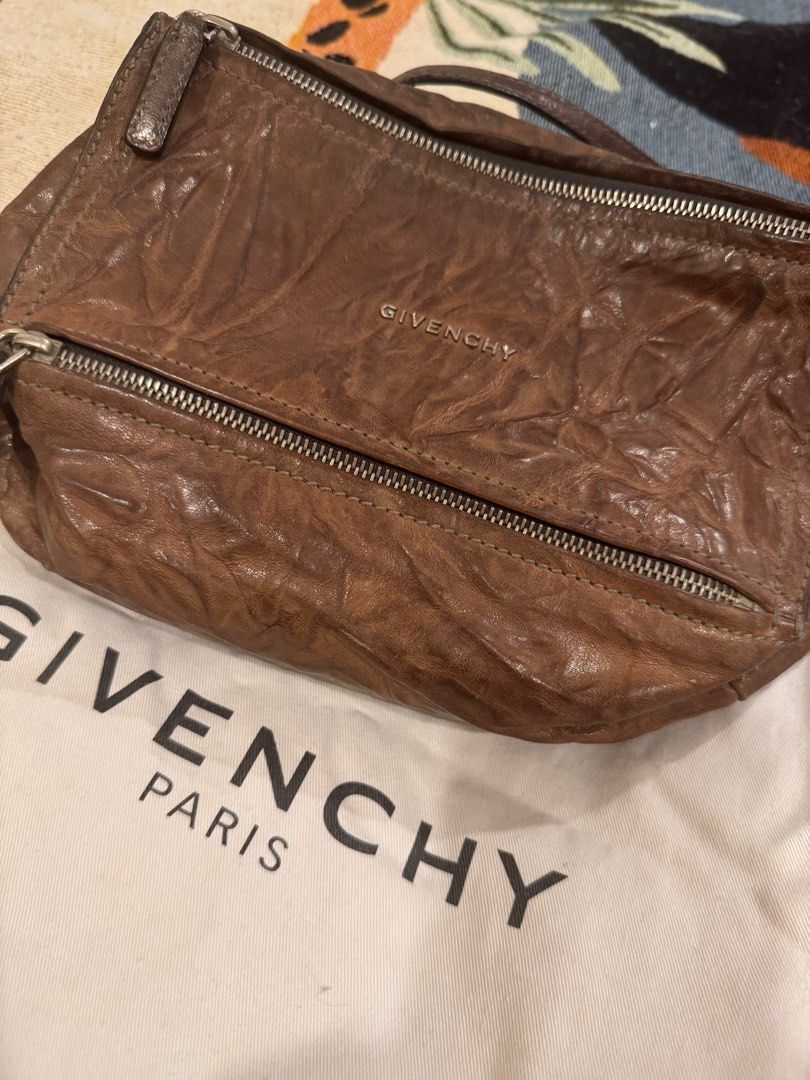 Givenchy Pandora Mini Bag (Category: Luxury Bags & Wallets) located in Taguig. Submitted by mhay.molina (Listing ID 1413350838, Image 2). Description: ALL MUST GO!!! LAST PRICE POSTED - Authentic Givenchy Pandora Mini bag - Brown leather - Silver-tone hardware - Top zip closure - Includes dust bag and original receipt - Shoulder strap - Givenchy logo on front - Made in Italy.