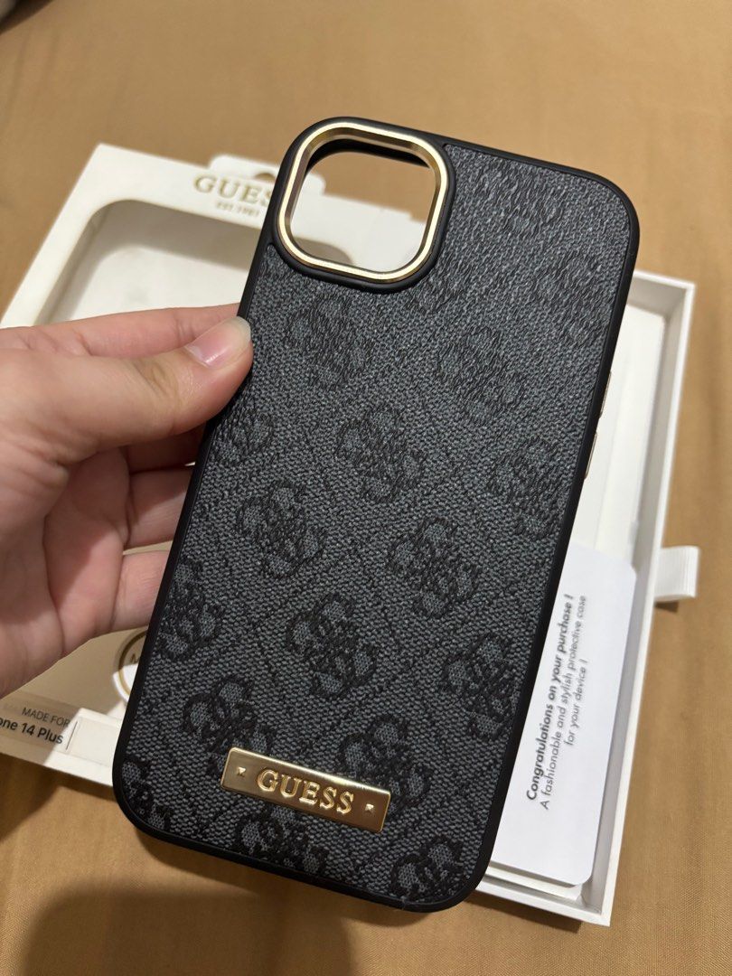 Guess Iphone 14 Plus/ Iphone 15 Plus MagSafe Case (Category: Cases & Sleeves) located in Quezon City. Submitted by ccloset_ (Listing ID 1413399603, Image 3). Description: - Guess iPhone 14 Plus / 15 Plus Case - Features the iconic Guess logo pattern - Designed with MagSafe compatibility - Offers drop protection - Slim profile - Easy snap-on design -No visible issues -Used 3-4x only.