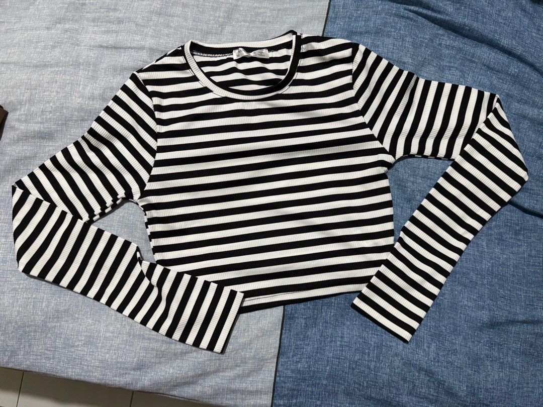 Happiness Striped Long Sleeve Top Size 36 (Category: Longsleeves) located in Manila. Submitted by itswayne (Listing ID 1413265016, Image 2). Description: - Black and white stripes longsleeve top - Cropped fit - Round neckline - Ribbed texture - Fitted sleeves - Size 36 - Made in Turkey - rfs: declutter - used once only.