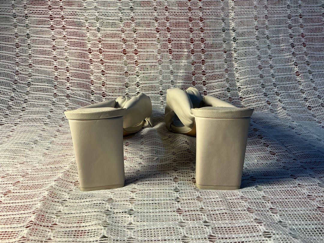 H&M White Heeled Sandals Kitten Heels (Category: Heels) located in Taguig. Submitted by ben_is_here (Listing ID 1413321784, Image 3). Description: H&M off-white sandals/kitten heels with stylish knotted strap detail Size 6 US Female Almost new condition, never been worn.