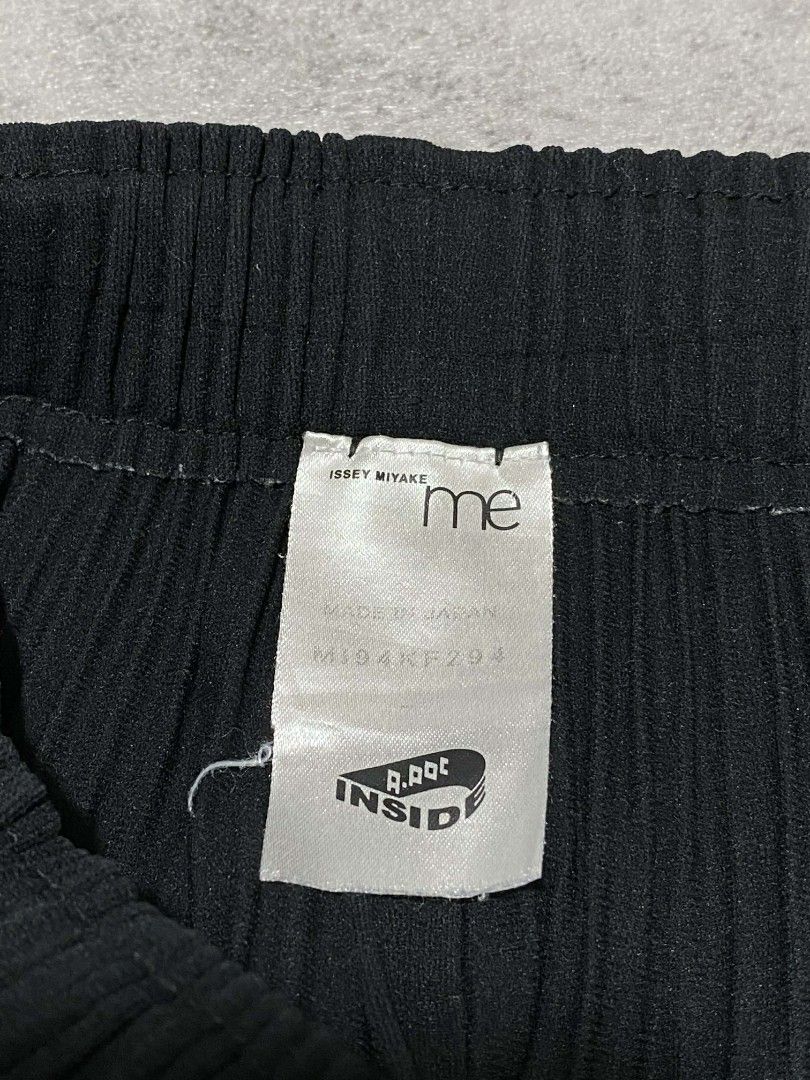 ISSEY MIYAKE ME LAYERED FRONT PANEL TROUSER BY A-POC INSIDE (Category: Luxury Apparel) located in Balanga. Submitted by dig_gear (Listing ID 1413261681, Image 3). Description: ISSEY MIYAKE ME LAYERED FRONT PANEL TROUSER BY A-POC INSIDE These pants have a distinctive design feature where the front material is layered to look like two panels, or "wings,". The A-POC (A Piece Of Cloth) line is a signature Issey Miyake concept that involves creating g