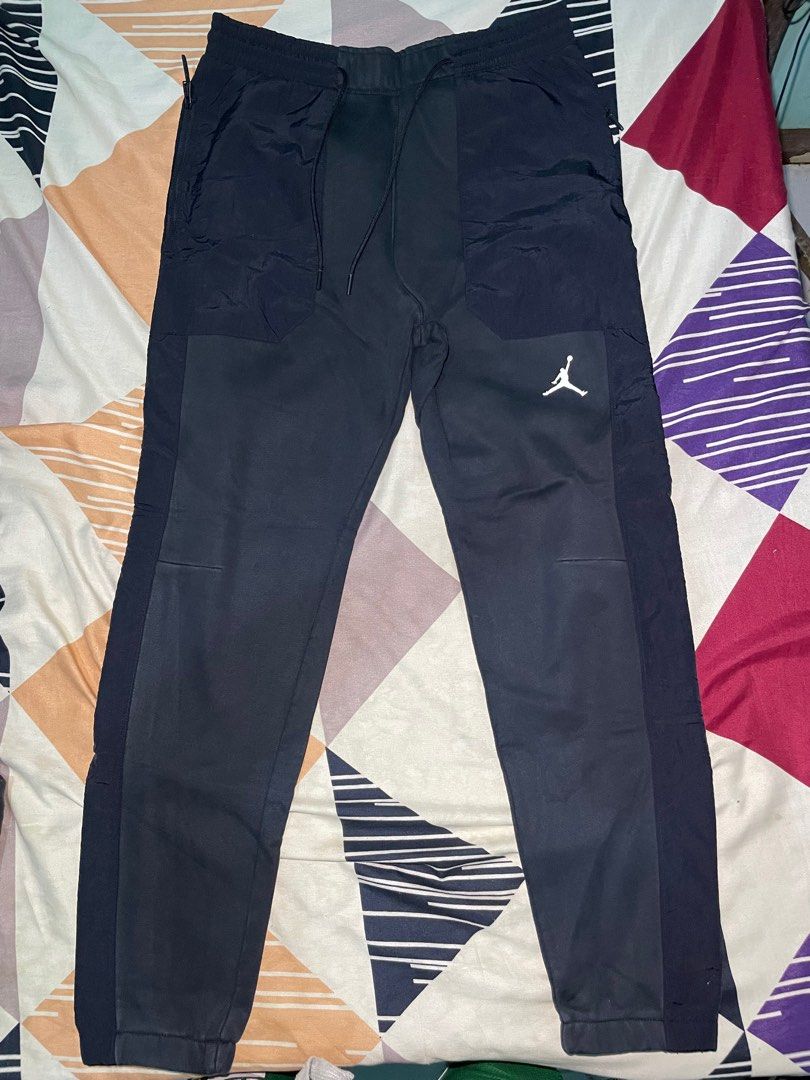 Jordan 23 Engineered Pants - (Category: Joggers) located in Tagbilaran City. Submitted by thrifter23 (Listing ID 1413348684, Image 1). Description: Dimes: L32 W40 Issues: pinhole(repaired) See last pic Solid material like nike tech.