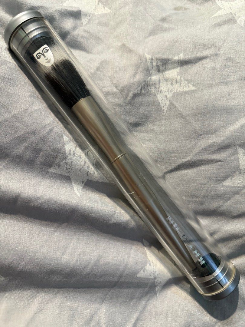 Kryolan Premium Smoothing Stippling Brush 9742 (Category: Makeup) located in Tagaytay City. Submitted by bjn25 (Listing ID 1413290394, Image 2). Description: Key Features: Product: Premium Smoothing Brush. Code: 9742 (or K9742). Material: Premium synthetic hair (or blend with natural fibers). Purpose: To apply and blend foundation smoothly and perfectly. Design: Elegant metal stem in a silver look. Comes with the original protective canister. Not