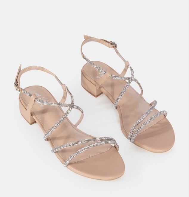 Lapis By Vybe Nude Strappy 3cm Heeled Sandals (Category: Women's Shoes) located in Sydney. Submitted by desirably (Listing ID 1413424528, Image 1). Description: Lapis By Vybe Nude Strappy 3cm Heeled Sandals(Size 6, EUR37) for $20. Worn lightly&in excellent condition. Super stylish yet comfy to go with any outfit, adding a touch of glitz and glamour! - Low block 3cm heel - Crossover ankle straps - Two horizontal top bands - Material: Synthetic (Ve