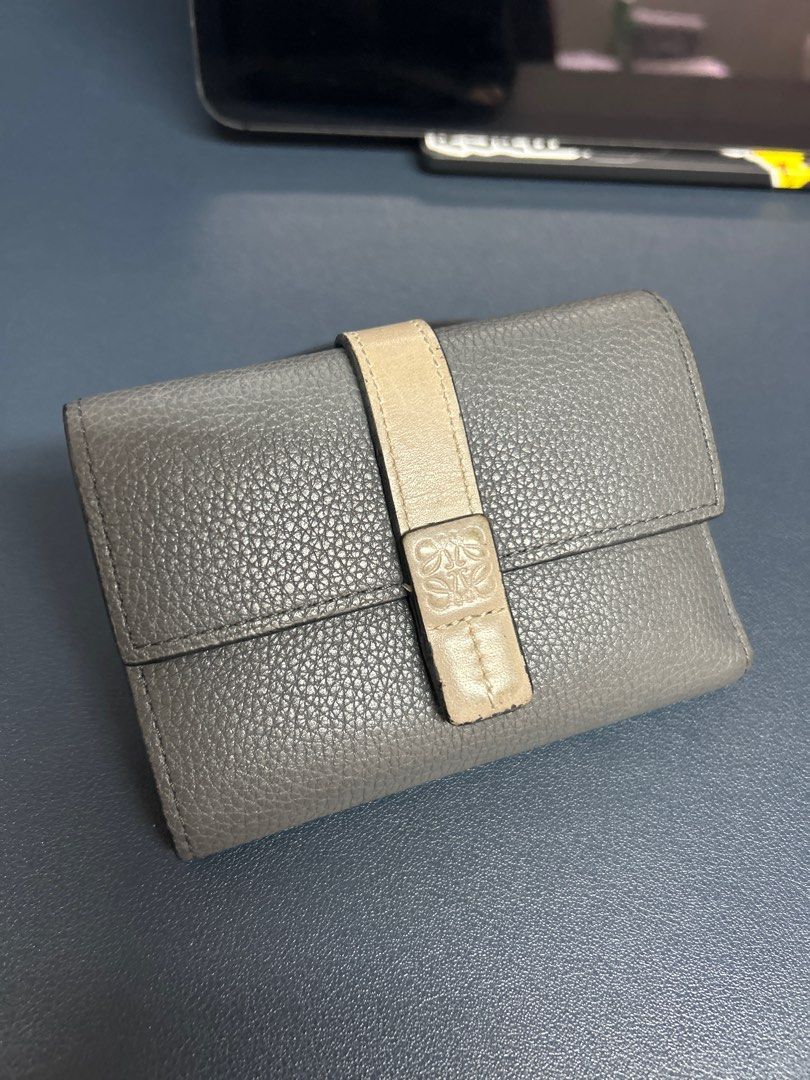 LOEWE Anagram Leather Trifold Wallet (Category: Luxury Bags & Wallets) located in Pasig City. Submitted by closet4hope (Listing ID 1413234867, Image 1). Description: Authentic LOEWE Anagram Trifold wallet in soft grained calfskin leather - Loewe logos in front of wallet and when you open - with zippered compartment for coins or other items - multiple card slots - size when open and laid flat (allow for slight discrepancies) width = 22 cm height =