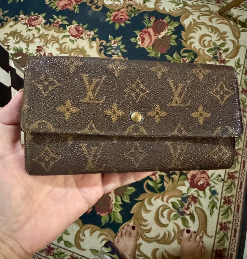 Louis Vuitton Monogram Sarah Wallet (Category: Luxury Bags & Wallets) located in Muntinlupa City. Submitted by cher_ami (Listing ID 1413297114, Image 1). Description: - Authentic Louis Vuitton Monogram Sarah wallet - Features the iconic LV monogram design - Cashcompartments - Secure snap closure - Includes a zippered pocket - Exterior and interior show some wear and tear -No date code. It’s vintage -No cracks -Zipper is smoothly working -No inclu