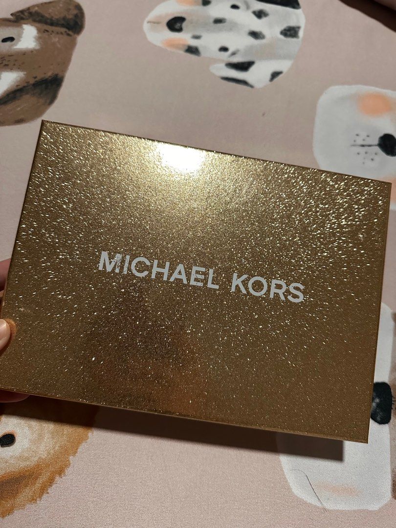 Michael Kors Adjustable Belt Bag (Category: Luxury Bags & Wallets) located in Lucena. Submitted by keigarcia (Listing ID 1413301421, Image 2). Description: - Authentic Michael Kors belt bag - Features the iconic MK logo print - Comes with the original box - Main compartment with zipper closure - Interior pocket - Adjustable belt - Perfect for carrying essentials - BRAND NEE.