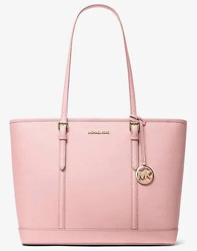Pink travel tote bag (Category: Tote Bags) located in Quezon City. Submitted by siasmittens (Listing ID 1413433483, Image 2). Description: - Michael Kors Jet Set Travel tote bag - Color: Powder Blush - Size: LARGE kasya laptop - Michael Kors logo on the front (nakabalot sa pic) I got this gift from my mom this christmas! Does not come with the original box last price na po sorii Rsf: too big for meee 2400 na lang if bibilin with backpack.