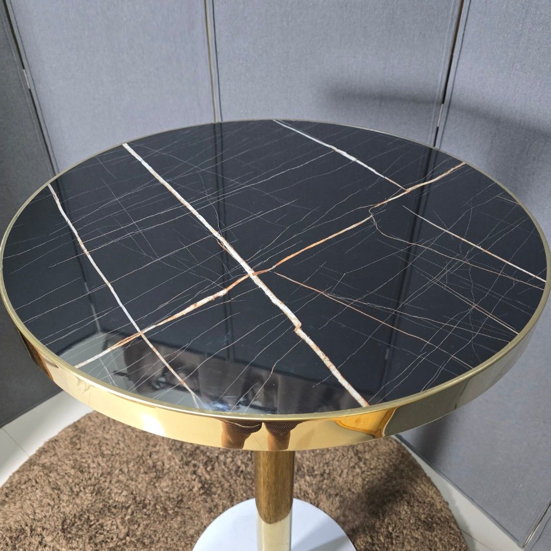 Modern Gold Accent Round Bar Table (Category: Tables & Sets) located in Pasig City. Submitted by millennialthrifter (Listing ID 1413236515, Image 3). Description: 🔥MODERN GOLD ACCENT ROUND BAR TABLE- ( 4900 PREV PRICE)❗️ Black marble-look stone top paired with a sleek gold pedestal base 🤍 Perfect as a side table, café table, or condo accent piece. ✅️ Elegant & modern design ✅️ Heavy and sturdy ✅️ Statement piece for any space ✅️ Easy to clean ✅