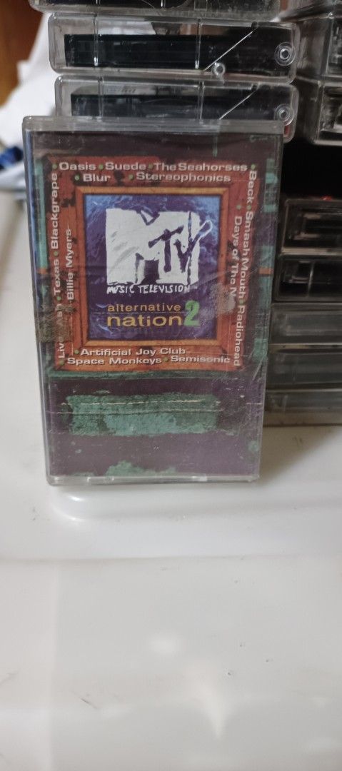 MTV Alternative Nation 2 Cassette Tape (Category: CDs & DVDs) located in Cavite. Submitted by zelcastillo (Listing ID 1413247029, Image 1). Description: - MTV Alternative Nation 2 cassette tape - Features various artists including Oasis, The Seahorses, Smash Mouth, Billie Myers, Suede, Stereophonics, Texas, Semisonic, Live, Ash, Blur, Artificial Joy Club, Beck, Black Grape, and Radiohead. - Compilation (P) & (C) 1998 Universal Music Philippines..