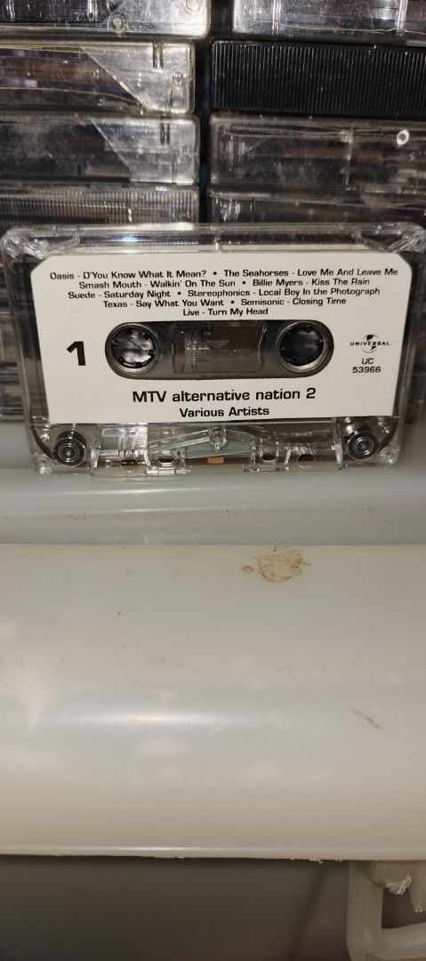 MTV Alternative Nation 2 Cassette Tape (Category: CDs & DVDs) located in Cavite. Submitted by zelcastillo (Listing ID 1413247029, Image 2). Description: - MTV Alternative Nation 2 cassette tape - Features various artists including Oasis, The Seahorses, Smash Mouth, Billie Myers, Suede, Stereophonics, Texas, Semisonic, Live, Ash, Blur, Artificial Joy Club, Beck, Black Grape, and Radiohead. - Compilation (P) & (C) 1998 Universal Music Philippines..