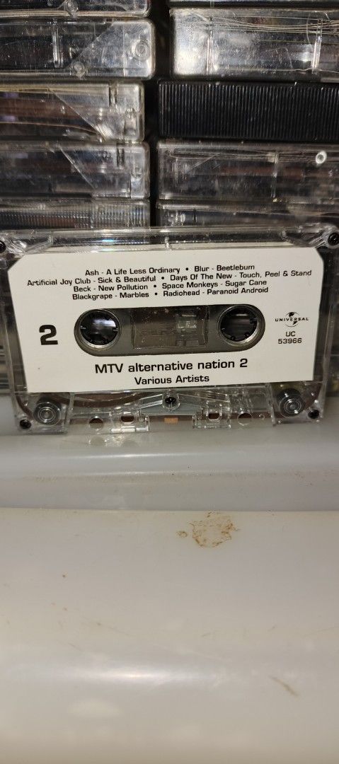 MTV Alternative Nation 2 Cassette Tape (Category: CDs & DVDs) located in Cavite. Submitted by zelcastillo (Listing ID 1413247029, Image 3). Description: - MTV Alternative Nation 2 cassette tape - Features various artists including Oasis, The Seahorses, Smash Mouth, Billie Myers, Suede, Stereophonics, Texas, Semisonic, Live, Ash, Blur, Artificial Joy Club, Beck, Black Grape, and Radiohead. - Compilation (P) & (C) 1998 Universal Music Philippines..