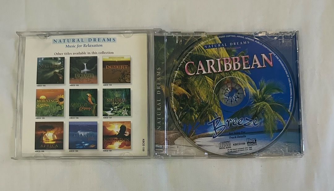 Natural Dreams Caribbean Breeze CD (Category: CDs & DVDs) located in San Juan City. Submitted by looneybin559 (Listing ID 1413405205, Image 2). Description: - Natural Dreams CD - Features steel drums and soothing melodies - Tracks include: "Sunrise Departure," "Island Waterfall," and "Sunset in Cozumel" - Total playing time: 62:27 - Made in England Hard to Find CD. In Good Condition. WYSIWYG. ***ITEM IS AVAILABLE IF YOU CAN SEE THIS MESSAGE. Paym