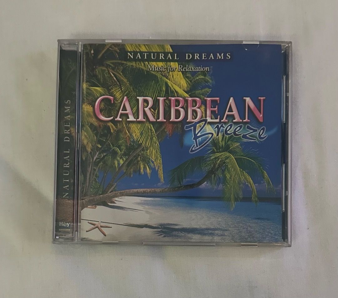 Natural Dreams Caribbean Breeze CD (Category: CDs & DVDs) located in San Juan City. Submitted by looneybin559 (Listing ID 1413405205, Image 1). Description: - Natural Dreams CD - Features steel drums and soothing melodies - Tracks include: "Sunrise Departure," "Island Waterfall," and "Sunset in Cozumel" - Total playing time: 62:27 - Made in England Hard to Find CD. In Good Condition. WYSIWYG. ***ITEM IS AVAILABLE IF YOU CAN SEE THIS MESSAGE. Paym