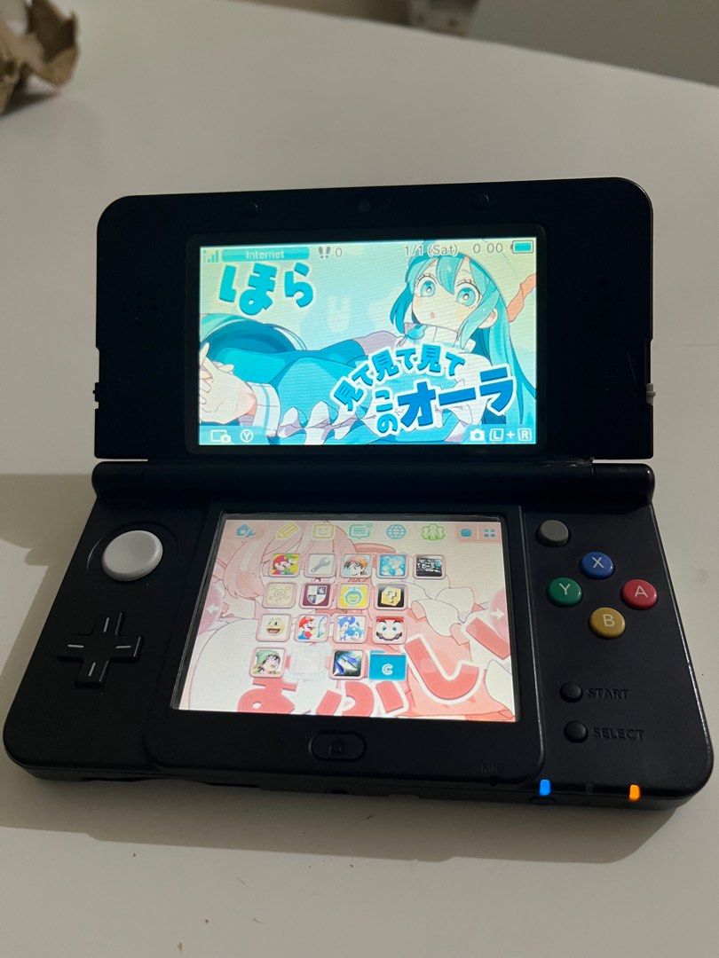 New Nintendo 3ds Regular Black (Category: Nintendo) located in San Juan City. Submitted by paboopy (Listing ID 1413426378, Image 2). Description: - New Nintendo 3DS Regular Black. - Includes all buttons and controls. - Console is in working condition. - CFW With games Issues: - Camera not working - Has damage near the hinge but still works fine (See last picture) Inclusion: - New Nintendo 3ds Black - Charger - SD Card - Stylus.