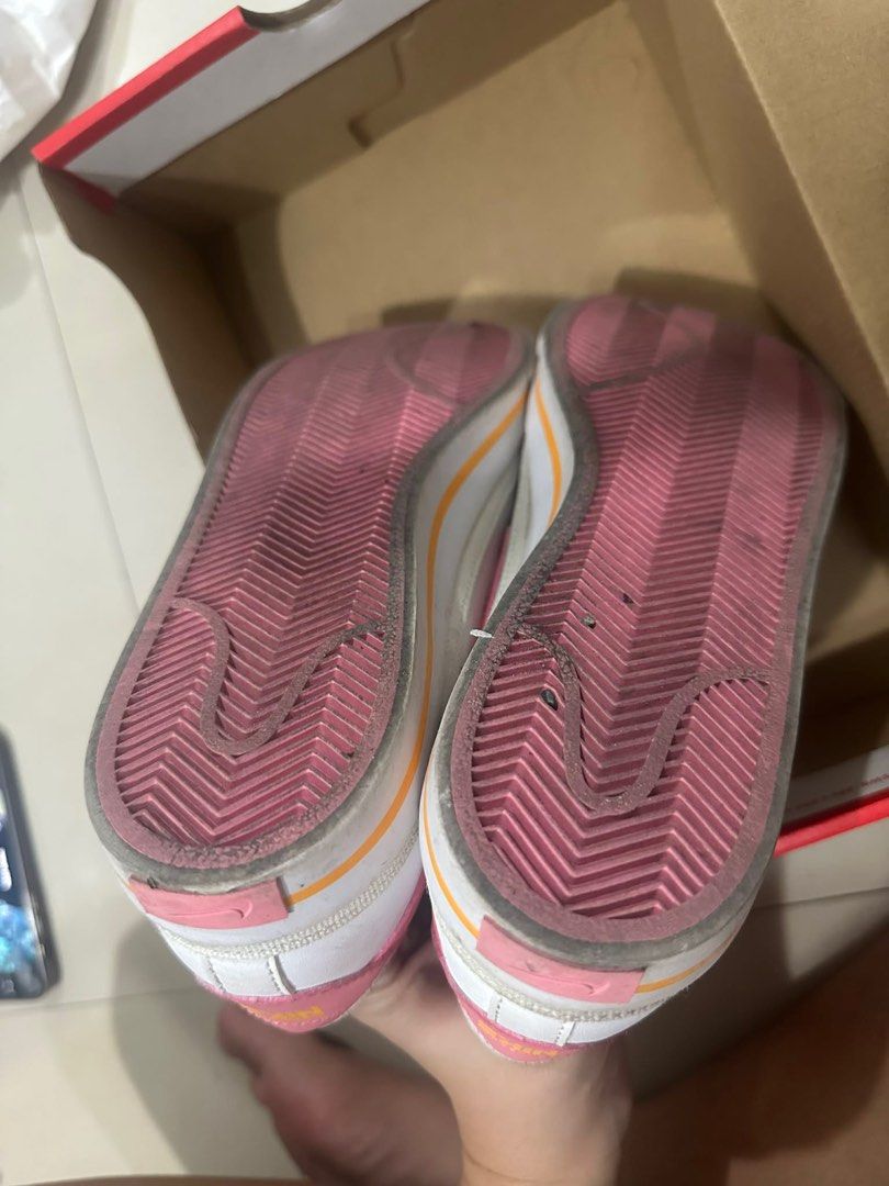 Nike Court Royale Sneakers (Category: Sneakers) located in Manila. Submitted by coco041516 (Listing ID 1413426053, Image 3). Description: - White Nike Court Royale sneakers - Pink swooshes and heel tabs - White soles with orange stripe - Pink insoles - Comes with original box Women size US 9 / 7y men .