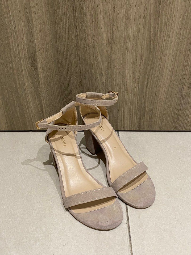 Olivia Block Heel Sandals (Category: Flats & Sandals) located in Mandaluyong City. Submitted by raspberryjamzzz (Listing ID 1413328975, Image 1). Description: - Olivia block heel sandals - Ankle strap for secure wear - Neutral color - Size 70 - Versatile for various outfits - Adds a touch of sophistication.