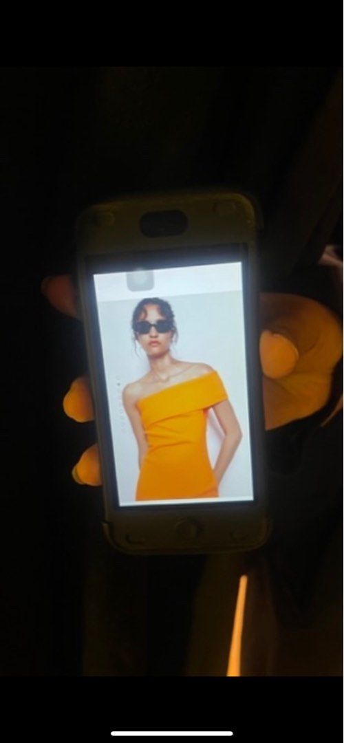 Orange Off-Shoulder Midi Dress (Category: Dresses) located in San Pedro. Submitted by offspaces__ (Listing ID 1413320204, Image 2). Description: - used only once - Orange Off-Shoulder Midi Dress - Size: M - Stylish off-shoulder design - Midi length - Perfect for special occasions.