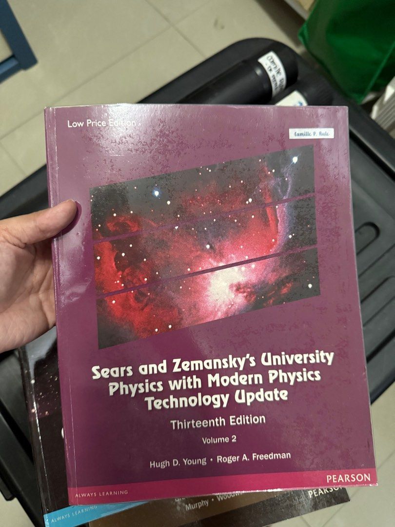 Pearson Sears & Zemansky's University Physics 13th ed Vol 2 (Category: Textbooks) located in Quezon City. Submitted by camillerule (Listing ID 1413315383, Image 1). Description: - Like New with plastic cover - SHS Textbook - University Physics with Modern Physics, Volume 2 - Thirteenth Edition, Technology Update - Authored by Hugh D. Young and Roger A. Freedman - Published by Pearson.
