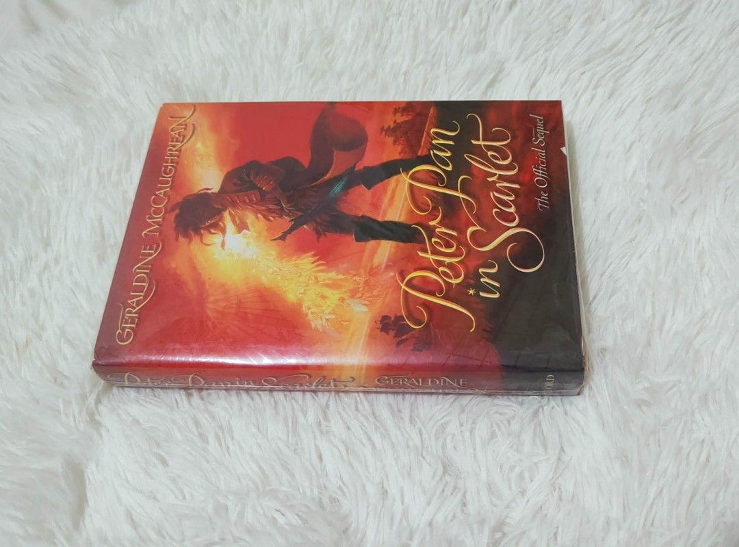 Peter Pan in Scarlet & Hidden Books (Category: Storybooks) located in Caloocan City. Submitted by andi289 (Listing ID 1413350211, Image 2). Description: - 'Peter Pan in Scarlet' by Geraldine McCaughrean - 'Hidden' by P.C. & Kristin Cast available. -All Authentic. -Minimal Creases. -Tan edges. -Can be bought in per piece or bundle. - Protected by plastic wrap. .