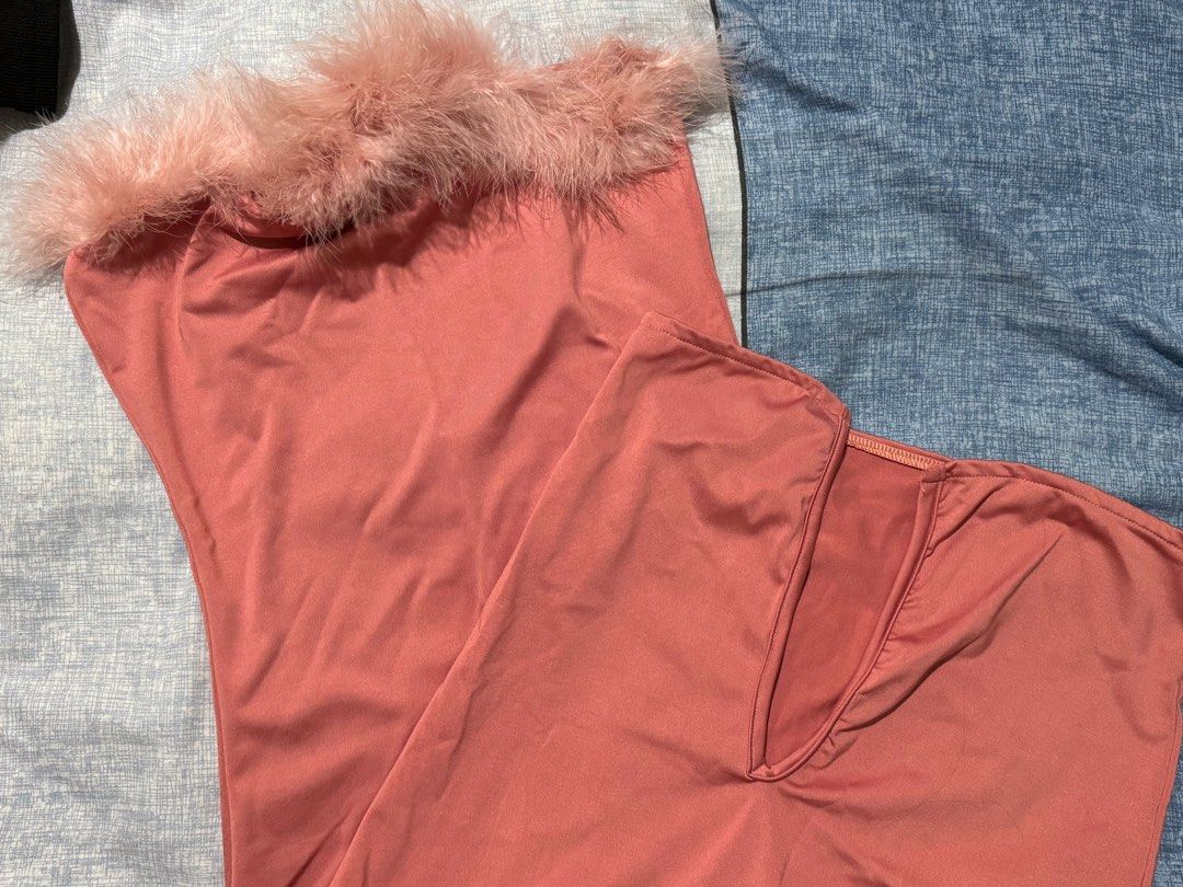 Pink Feather Trim Dress (Category: Dresses) located in Manila. Submitted by itswayne (Listing ID 1413282511, Image 1). Description: - Soft pink color - Strapless design - V-neckline - Feather trim detail - rfs: declutter - fur is light pink - really nice for simple night outs and hugs the body well !!.