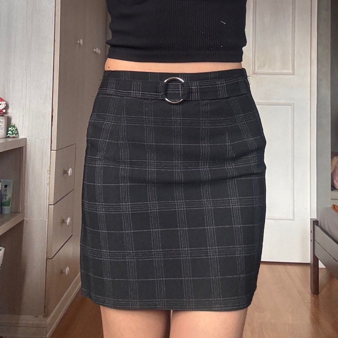 Plaid Mini Skirt with Belt (Category: Skirts) located in Quezon City. Submitted by kaeshops (Listing ID 1413364867, Image 1). Description: Decluttering my preloved clothes! PM me for more photos 🩷 items are negotiable if buying multiple items! Can do meet-ups or ship from Diliman, QC or Sampaloc, Manila - Plaid mini skirt - Straight cut - Built-in belt with silver buckle - Woven fabric - Simple and versatile design.