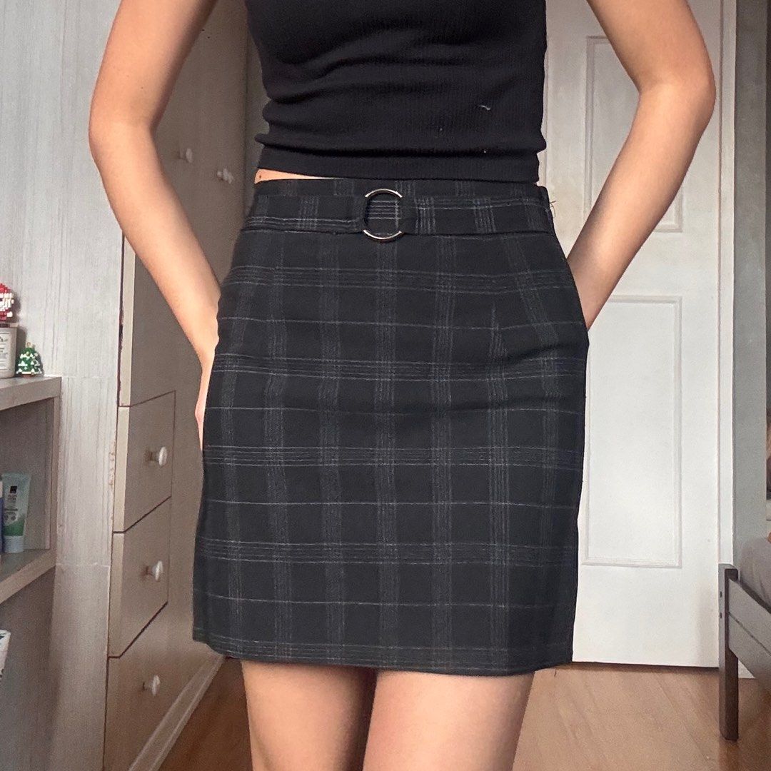 Plaid Mini Skirt with Belt (Category: Skirts) located in Quezon City. Submitted by kaeshops (Listing ID 1413364867, Image 3). Description: Decluttering my preloved clothes! PM me for more photos 🩷 items are negotiable if buying multiple items! Can do meet-ups or ship from Diliman, QC or Sampaloc, Manila - Plaid mini skirt - Straight cut - Built-in belt with silver buckle - Woven fabric - Simple and versatile design.