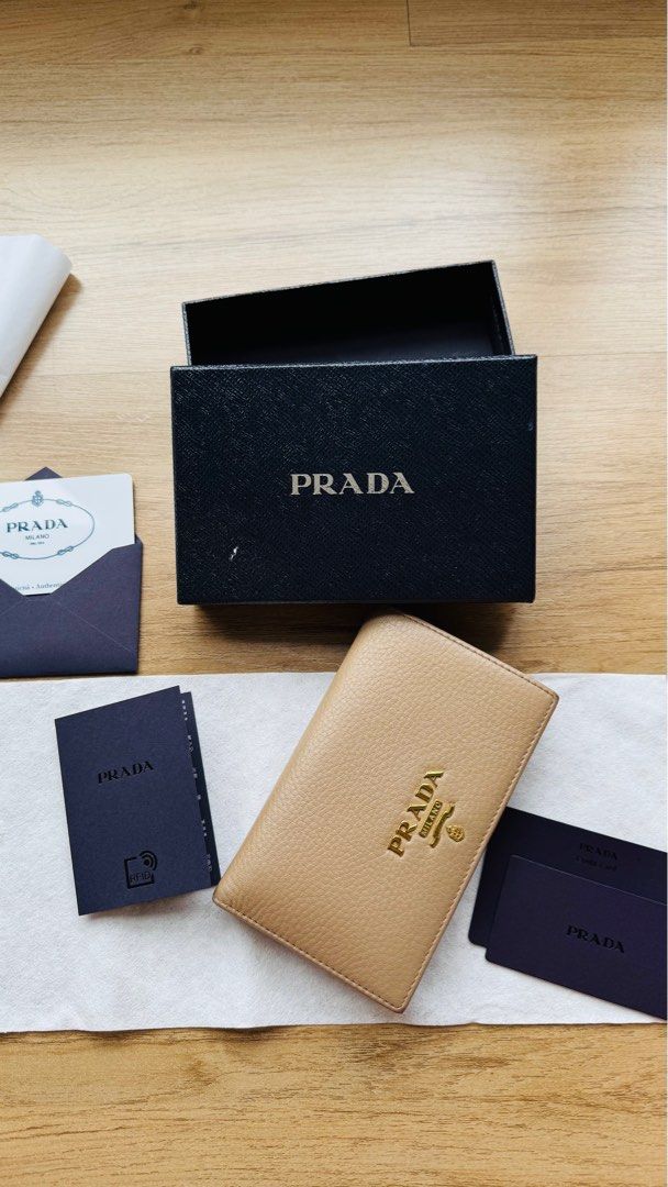 Prada Nude Bifold Wallet Cardholder (Category: Luxury Bags & Wallets) located in Pasig City. Submitted by decltter01 (Listing ID 1413318035, Image 1). Description: - Prada bifold wallet / card holder - in nude color - Made from Vitello Grain leather - Includes all original inclusions like box, authenticity card, cloth wrap. (credit cards for sample only!! Obviously not included haha) - lots of card slots -- especially in this cashless world! - Ca