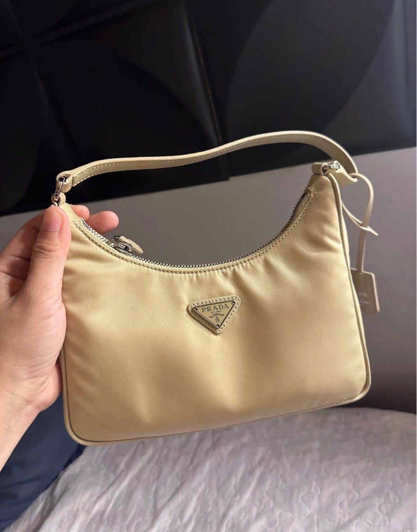 Prada Re Edition (Category: Luxury Bags & Wallets) located in Quezon City. Submitted by chaarmed (Listing ID 1413383615, Image 2). Description: Selling this baby 🙂 Bought brand new, barely used. PM if interested. RFS: Seldom use. With cards, dust bag.
