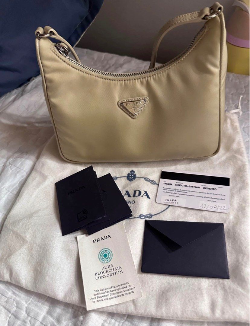 Prada Re Edition (Category: Luxury Bags & Wallets) located in Quezon City. Submitted by chaarmed (Listing ID 1413383615, Image 1). Description: Selling this baby 🙂 Bought brand new, barely used. PM if interested. RFS: Seldom use. With cards, dust bag.