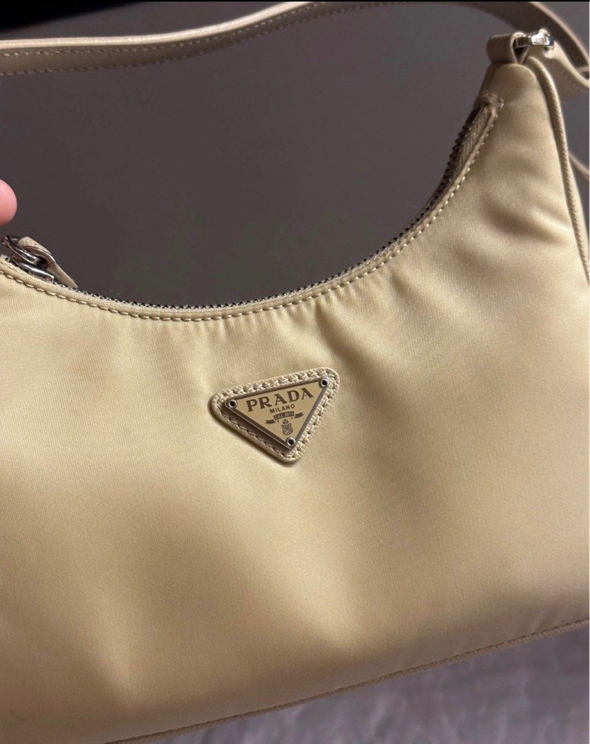 Prada Re Edition (Category: Luxury Bags & Wallets) located in Quezon City. Submitted by chaarmed (Listing ID 1413383615, Image 3). Description: Selling this baby 🙂 Bought brand new, barely used. PM if interested. RFS: Seldom use. With cards, dust bag.