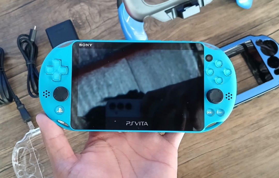PS VITA SLIM 2000 ( AQUA BLUE ) (Category: PlayStation) located in Paranaque City. Submitted by gideon_dawn (Listing ID 1413389328, Image 2). Description: PS VITA SLIM (NEGO) You can play PS1, PSP and PS VITA games Condition: - Good Condition - Working Camera Front/Rear - All Button Working & crisp - rear touch pad are working - No Ghost movement/Ghost Touch - 64GB - Jailbroken - Sound system 10/10 - Kinis 10/10 - Lalaruin mo nalang po Ma 'am & S
