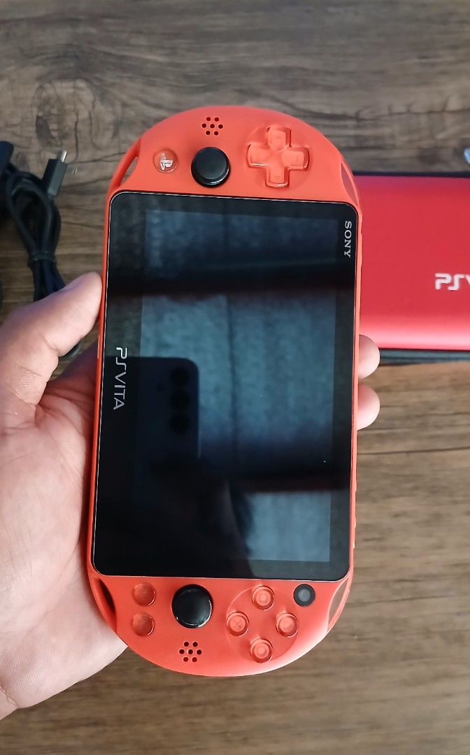 PS VITA SLIM 2000 (ORANGE) (Category: PlayStation) located in Paranaque City. Submitted by gideon_dawn (Listing ID 1413380343, Image 2). Description: PS VITA SLIM (NEGO) You can play PS1, PSP and PS VITA games Condition: - Pristine - Working Camera Front/Rear - All Button Working & crisp - rear touch pad are working - No Ghost movement/Ghost Touch - 64GB - Jailbroken - Sound system 10/10 - Kinis 10/10 - Lalaruin mo nalang po Ma 'am & Sir - No iis