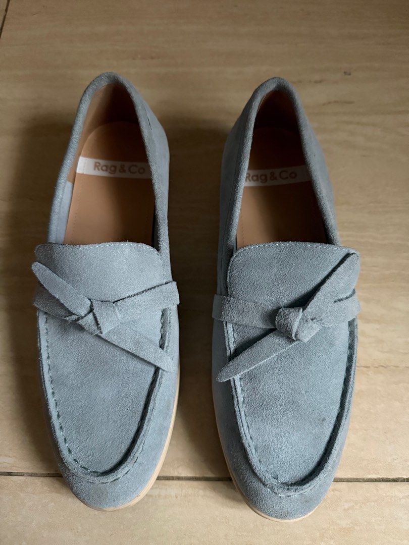 Rag & Co. Blue Suede Loafers (Category: Loafers) located in Pasig City. Submitted by darlouise (Listing ID 1413313921, Image 1). Description: - Rag & Co. loafers - Soft blue suede - Bow detail - Classic loafer design - Rounded toe - Low heel - Brand name on insole - Adds elegance to any outfit.