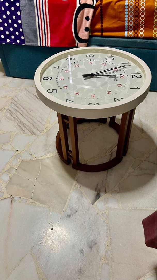 Side table (Category: Other Home Furniture) located in Singapore. Submitted by patjj (Listing ID 1413322292, Image 3). Description: Side bed with a clock face. Clock machnisime is faulty. My son uses it as a bed side table. Clearing house, my lost your gain. Self collect from cck 52, quick sale call 93666077. .