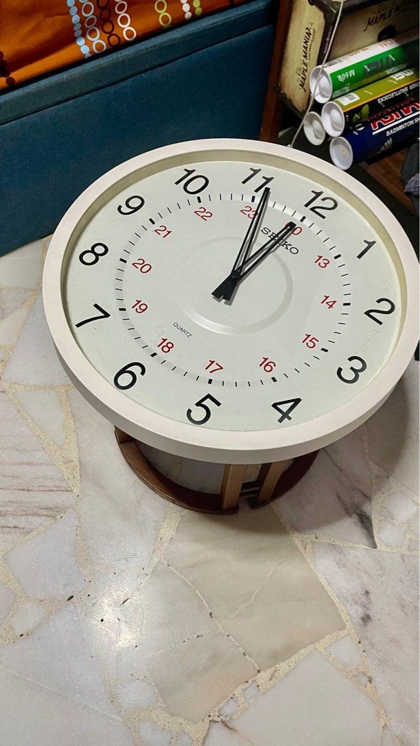 Side table (Category: Other Home Furniture) located in Singapore. Submitted by patjj (Listing ID 1413322292, Image 1). Description: Side bed with a clock face. Clock machnisime is faulty. My son uses it as a bed side table. Clearing house, my lost your gain. Self collect from cck 52, quick sale call 93666077. .