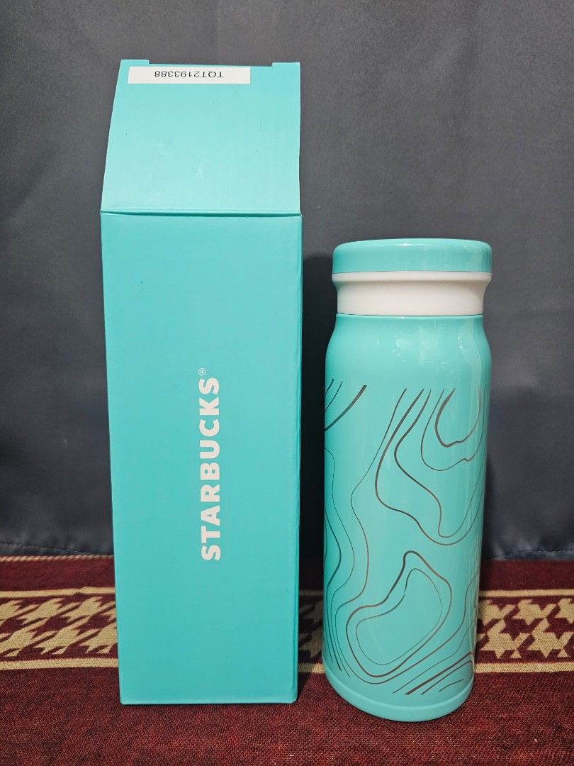 Starbucks Tumbler 2025 (Category: Water Bottles & Tumblers) located in Quezon City. Submitted by kcphilippines (Listing ID 1413360823, Image 1). Description: - Starbucks teal tumbler - Unique design - Includes original box - White accent near the top - Starbucks logo on box - Serial number sticker on box Kindly check photos for more details please. Shipping is not yet included in the price. Whatever shipping mode agreed by both sides will be shou