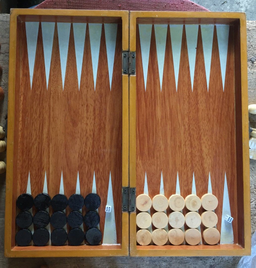 Sulida 3-in-1 Chess/Checkers/Backgammon (Category: Board Games & Puzzles) located in Quezon City. Submitted by sznn1111 (Listing ID 1413347922, Image 3). Description: - 3-in-1 board game set: Chess, Checkers, and Backgammon - Wooden board and game pieces - Chess pieces in brown and white - Backgammon set includes dice and game pieces - Board folds for convenient storage.