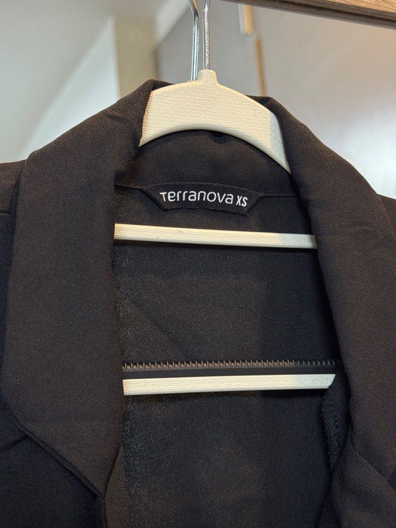 Terranova XS Black Bodysuit (Category: Others Tops) located in Makati City. Submitted by sphpnd (Listing ID 1413282064, Image 3). Description: - Terranova black bodysuit - Collared, wrap-style front - Long sleeves with buttoned cuffs - Snap closures at the bottom - Size: XS.