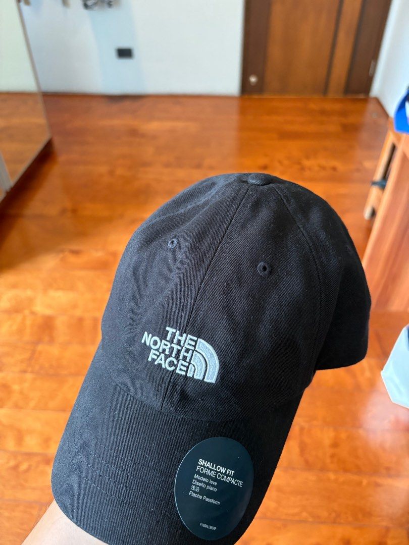 The North Face Shallow Fit Cap (Category: Caps & Hats) located in San Juan City. Submitted by ralphpatrickdy (Listing ID 1413242125, Image 2). Description: - The North Face black cap - Features the brand's logo - 'Shallow Fit' model - Classic and versatile accessory.
