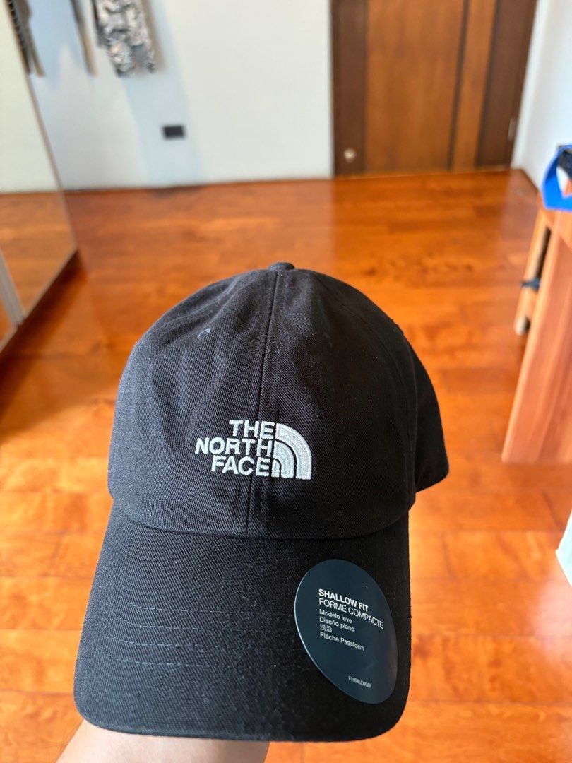 The North Face Shallow Fit Cap (Category: Caps & Hats) located in San Juan City. Submitted by ralphpatrickdy (Listing ID 1413242125, Image 1). Description: - The North Face black cap - Features the brand's logo - 'Shallow Fit' model - Classic and versatile accessory.