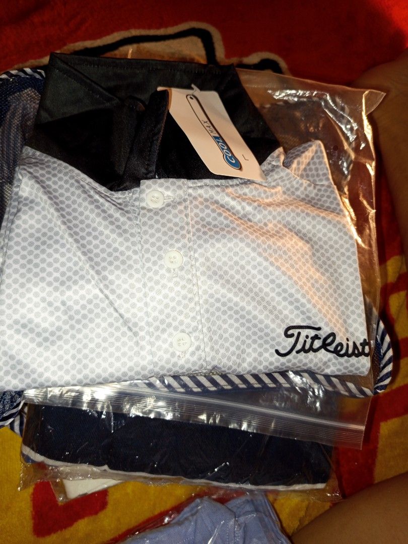 Titleist Golf Shirt (Category: Golf) located in Manila. Submitted by mysteriousjohnny (Listing ID 1413235387, Image 3). Description: - Brand new Titleist golf shirt - Stylish white and gray patterned design - Features a classic button-down front - Includes a practical chest pocket - Accented with black details on sleeves and hem - Still in original packaging - Size Large - Cool dry.