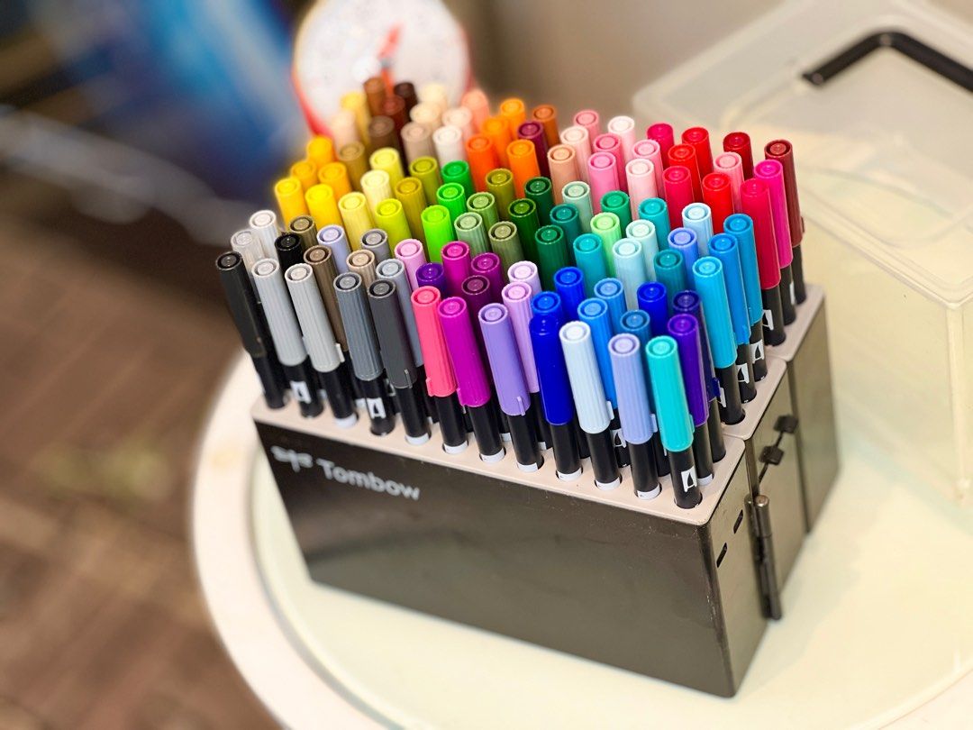 Tombow Dual Brush Pen Set (Category: Stationery & School Supplies) located in Bulacan. Submitted by rock_off.thriftshop.ph (Listing ID 1413384265, Image 3). Description: - Tombow Dual Brush Pen Set - Wide range of vibrant colors included - Perfect for lettering, drawing, and coloring - Comes in a black storage case with a clear lid - Ideal for artists and hobbyists.