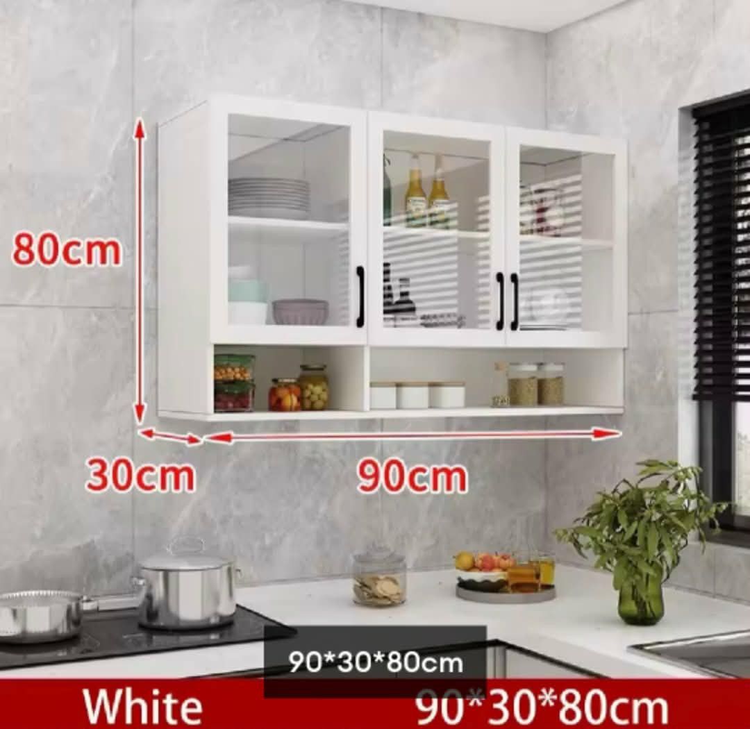 Transparent Wall Cabinet (Category: Shelves, Cabinets & Racks) located in Manila. Submitted by nhi_nin (Listing ID 1413281969, Image 2). Description: - White kitchen wall cabinet - Glass doors - Available sizes: 120x30x80cm and 90x30x80cm - Multiple storage compartments - Includes lower shelf - Perfect for kitchen essentials - Clean, modern design.
