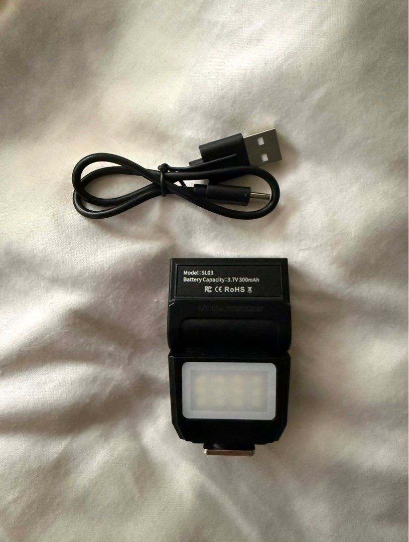 Ulanzi Spark Lite SL03 Flash (Category: Flashes) located in Manila. Submitted by swapog (Listing ID 1413237192, Image 3). Description: - Ulanzi Spark Lite SL03 flash - Includes: Flash unit, charging cable, original box - Built-in LED light - Designed for cameras - Model: SL03 - Battery: 3.7V 300mAh https://www.henryscameraphoto.com/Ulanzi-SL03-Spark-Lite-Camera-Flash?srsltid=AfmBOorO8F-nPZrYclMx27JOSDDR0nHeRNWhUiXsG50IaQP09dMeP82D.