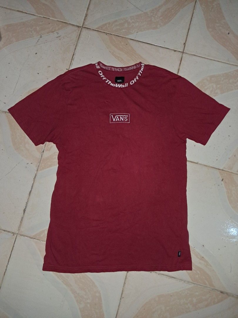 Vans Off The Wall T-Shirt - Maroon (Category: Tshirts & Polo Shirts ) located in Silang. Submitted by segundalifestyle (Listing ID 1413263211, Image 1). Description: - Maroon Vans t-shirt - Size: Medium - 19 X 28 inches - Features "Off The Wall" text on collar - Vans logo on chest - Classic crew neck design .