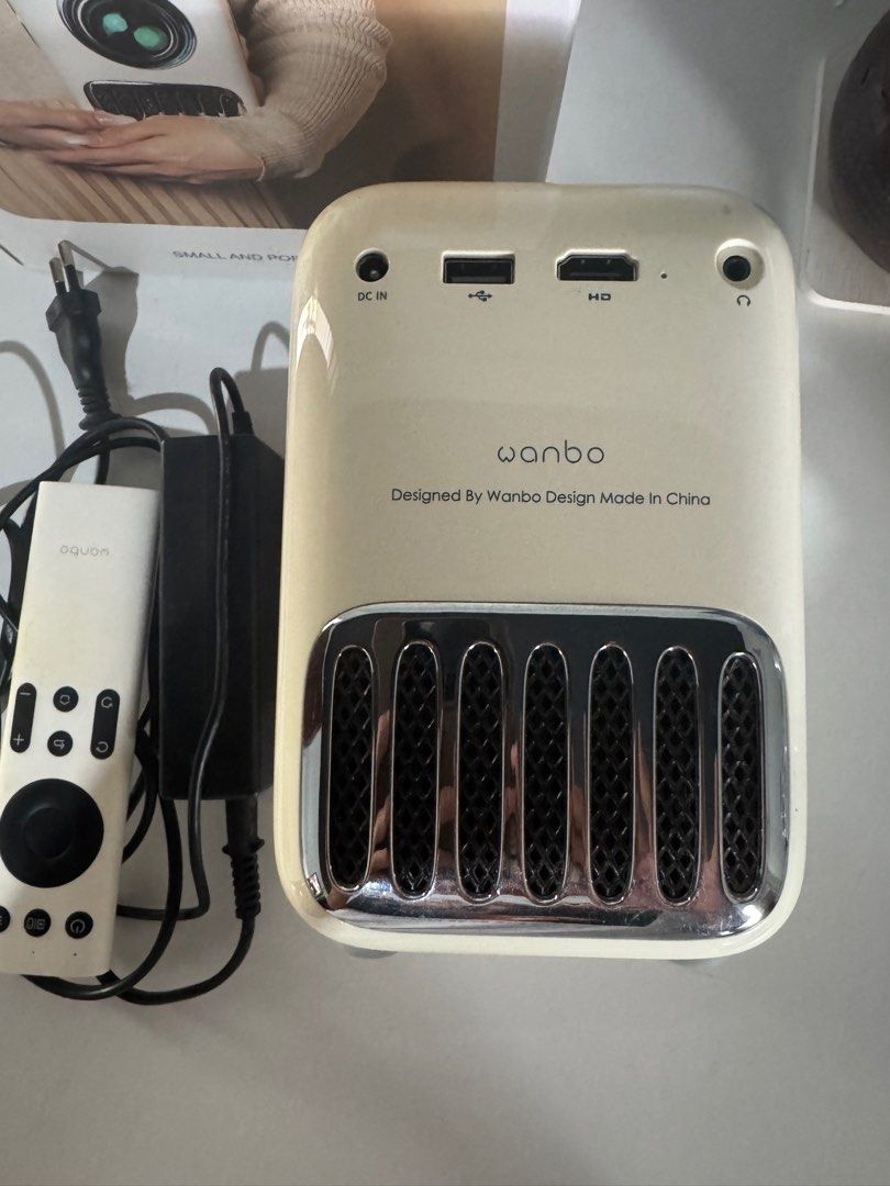 Wanbo T2R Max Portable Projector (Category: Projectors) located in Gabaldon. Submitted by stvibe (Listing ID 1413281139, Image 3). Description: -Wanbo T2R Max Portable Projector 1080P 4K Decode Android Bluetooth Phone Mirror 3W Speaker Wi-Fi - Includes remote control - Features HD input - Electronic keystone correction - Fully sealed light engine - Comes with original box - can’t do same day delivery, we’re in province. J&T shipping only.