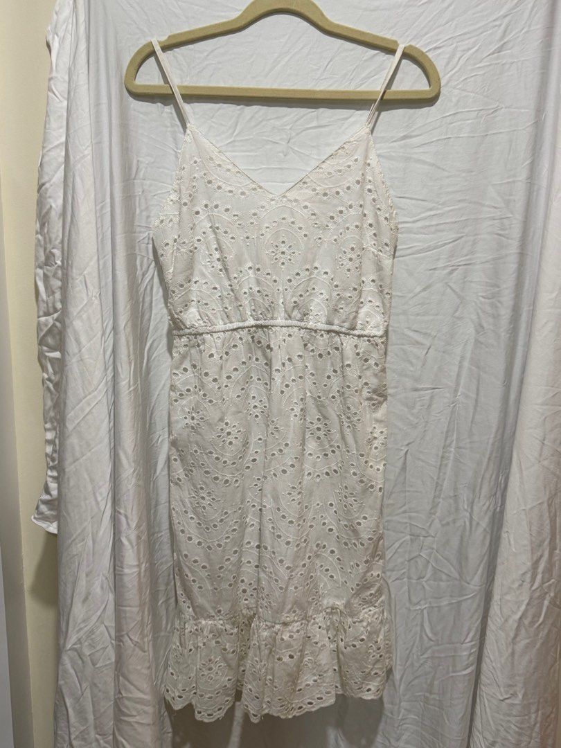White Eyelet Dress - Size S (Category: Dresses) located in Paranaque City. Submitted by vjau_ (Listing ID 1413394296, Image 1). Description: Brand new with tags but has minor stains .