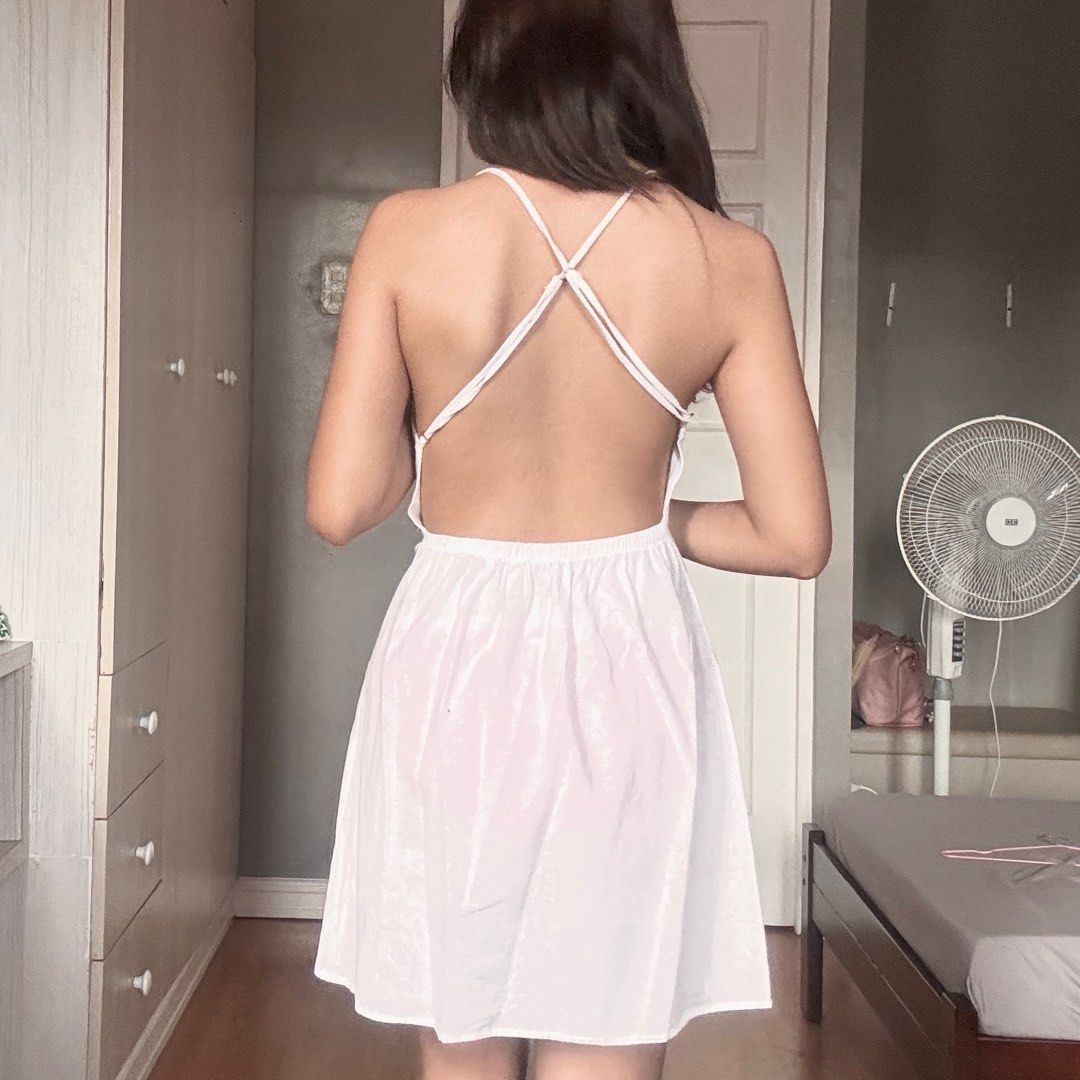 White Linen Halter Dress (Category: Dresses) located in Quezon City. Submitted by kaeshops (Listing ID 1413364786, Image 3). Description: Decluttering my preloved clothes! PM me for more photos 🩷 items are negotiable if buying multiple items! Can do meet-ups or ship from Diliman, QC or Sampaloc, Manila - White linen halter dress - Backless design - Fitted bodice - Flared skirt - Lightweight fabric, but slightly see through - Perfect for warm wea