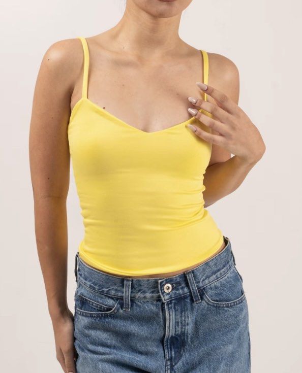 Yellow Sleeveless Top (Category: Sleeveless) located in Manila. Submitted by decluttersbyn (Listing ID 1413334929, Image 1). Description: .
